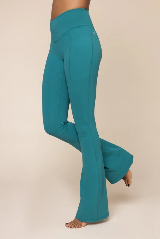 Crisscross Hourglass® Flared Leggings With Pockets - Emerald 1 Crisscross Hourglass® Flared Leggings With Pockets - Emerald